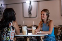 two young people with coffee